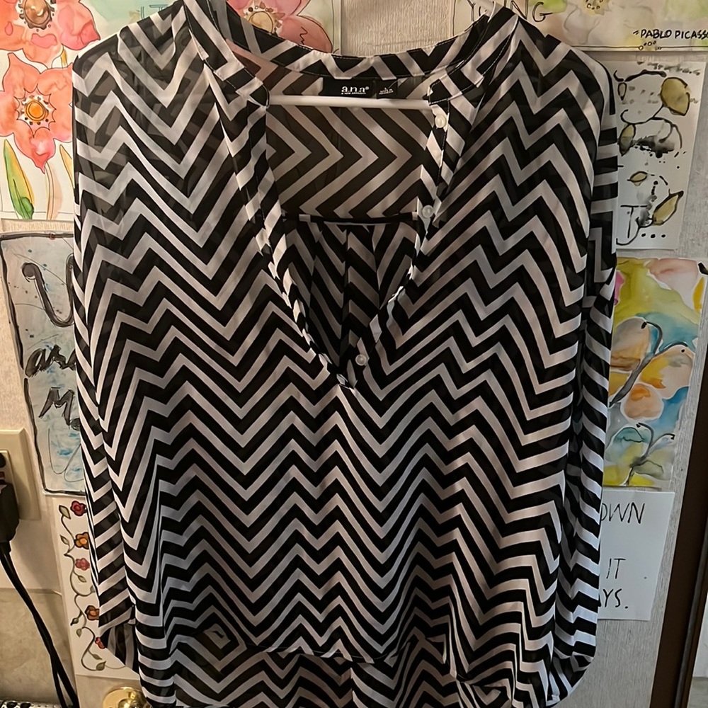 Graphic design black and white sheer button up blouse